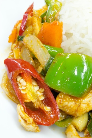 Stir fry chicken and chili in oil の写真素材