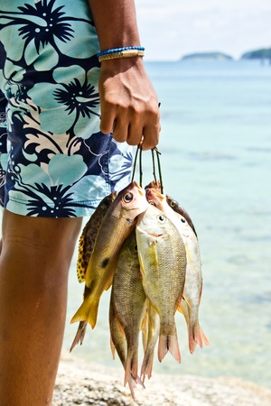 Sea Gypsies and andaman fish の写真素材