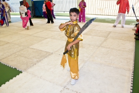 PHUKET - JUNE 5  Unidentified players performs during the Men s Wushu gun shu competition at National Youth Games, Phuket 2012 on June 5 ,2012 inPhuket,Thailandのeditorial素材