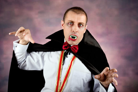 Portrait of a man with Count Dracula style make-up  Shot in a studio 