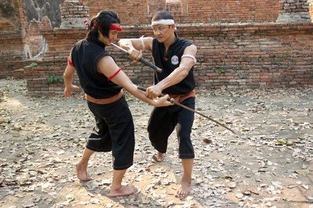 AYUTTHAYA - FEB 18  Fighters take part in a Muay Boran demonstration at Wat Worachet on Feb 18, 2013...
