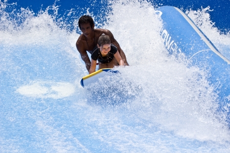 PHUKET THAILAND JUNE 16  Unidentified surfer on the Flow Rider aboard Surf House Phuket on June 16,2013 at Kata Beach in Phuket Thailand   のeditorial素材