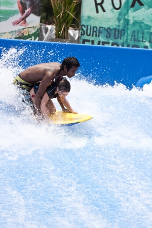 PHUKET THAILAND JUNE 16  Unidentified surfer on the Flow Rider aboard Surf House Phuket on June 16,2013 at Kata Beach in Phuket Thailand   のeditorial素材