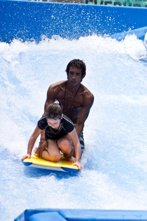 PHUKET THAILAND JUNE 16  Unidentified surfer on the Flow Rider aboard Surf House Phuket on June 16,2013 at Kata Beach in Phuket Thailand   のeditorial素材