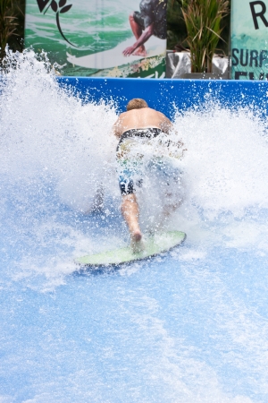 PHUKET THAILAND SEPTEMBER 16: Unidentified surfer on the Flow Rider aboard Surf House Phuket on June 17,2013 at Kata Beach in Phuket Thailand.
 
 のeditorial素材