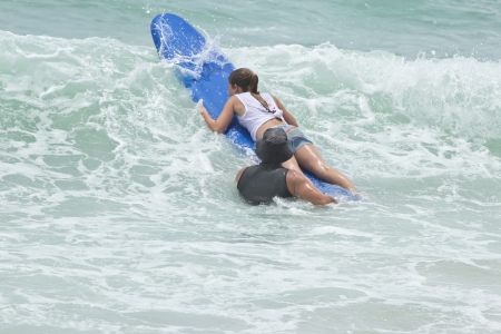 Kata beach, Phuket Thailand - September 6: Unidentified participants of the rip curl 
girls go surfing day 2013, September 6,2013 in Kata beach, Phuket Thailandのeditorial素材