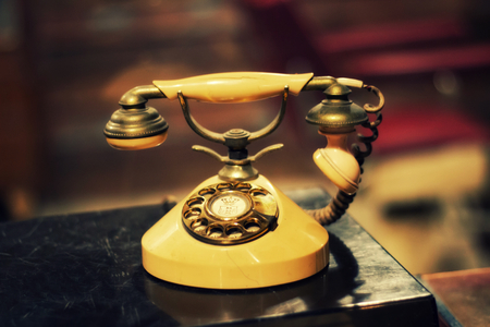 yellow vintage telephoneの写真素材