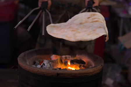 thai people cooking giant rice crispy or indigenous rice crackerの写真素材