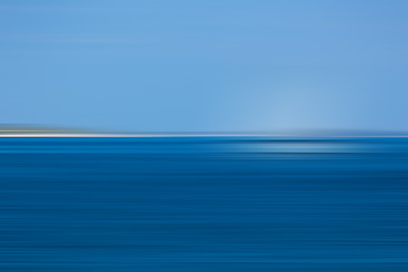 Light abstract gradient motion blurred background. Colorful lines texture wallpaperの写真素材