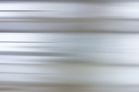 Light abstract gradient motion blurred background. Colorful lines texture wallpaperの写真素材