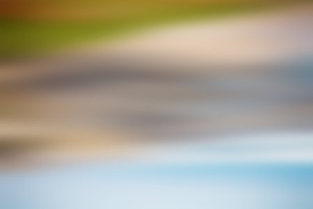 Light abstract gradient motion blurred background. Colorful lines texture wallpaper