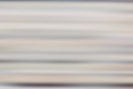 Light abstract gradient motion blurred background. Colorful lines texture wallpaper