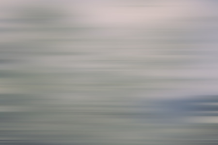 Light abstract gradient motion blurred background. Colorful lines texture wallpaperの写真素材