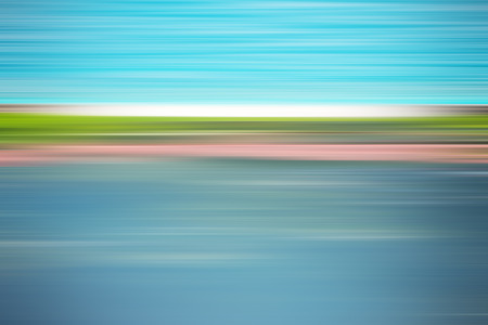 Light abstract gradient motion blurred background. Colorful lines texture wallpaperの写真素材