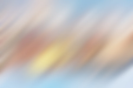 Light abstract gradient motion blurred background. Colorful lines texture wallpaper