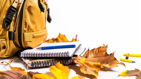 Back to school supplies with books, backpack and autumn leaves on white background, AI generatedの素材