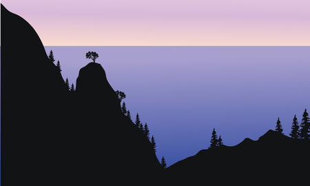 Silhouette of forest on the mountain with blue backgroundのイラスト素材