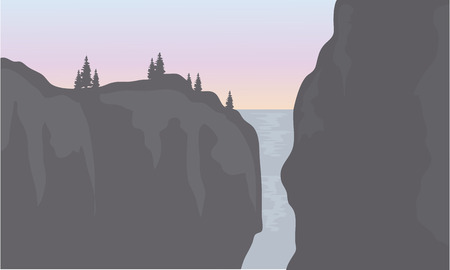 Silhouette of waterfall with gray backgrounds at the sunsetのイラスト素材