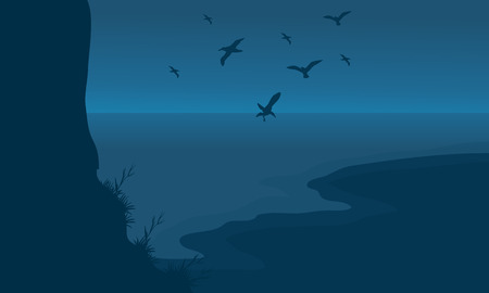 Silhouette of beach and birds at the nightのイラスト素材