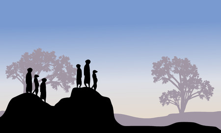 Silhouette of meerkat family in hillsのイラスト素材