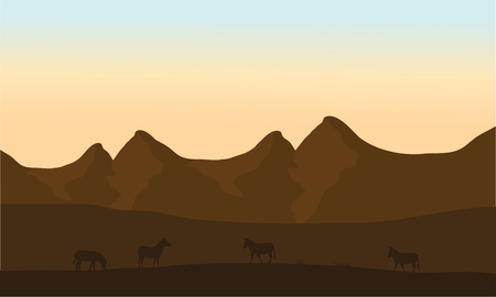 Silhouette of zebra in desert with brown backgroundsのイラスト素材