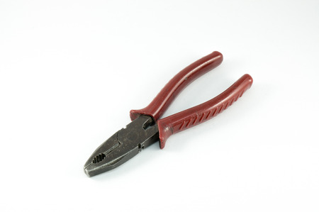 Combination pliers, very old and corroded and used pliers have dusty and rusty on white backgroundの写真素材