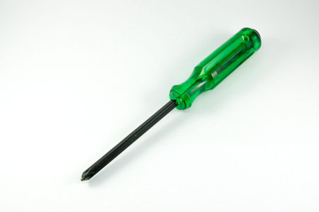 Green Screwdriver on isolated white background