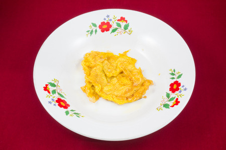 fried beaten egg on dishの写真素材