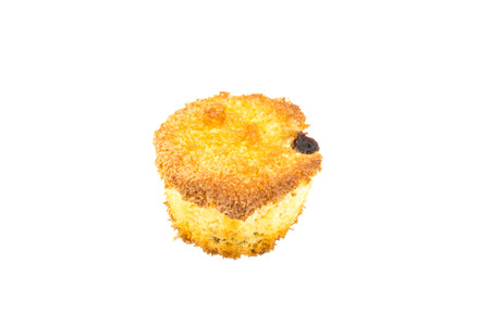 homemade sponge cake with raisin isolated on white backgroundの写真素材
