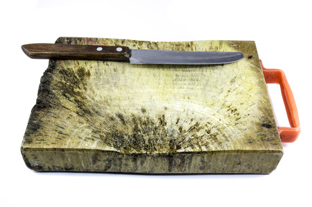 wood plate (wood block) for cut ingredient and Peeling knife  isolated on white background with clipping pathの写真素材
