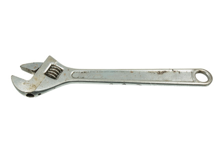 Old adjustable wrench isolated on white backgroundの写真素材