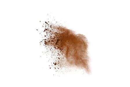 Coffee explosion isolated on white background.Explosion of brown powder, isolated on white background.の写真素材