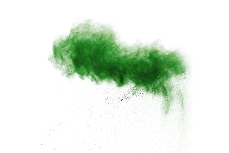 green powder explosion isolated on white backgroundの写真素材