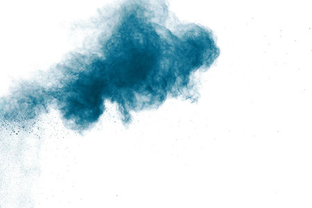Colorful powder explosion on white background. Colored cloud. Colorful dust explode. Paint Holi.