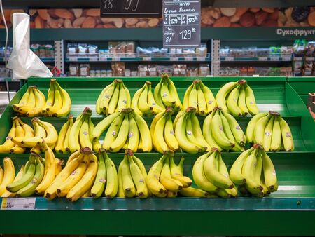 Bryansk, Russia - December 20, 2019: Shelf with bananas in the Metro store. Fruit departmentのeditorial素材