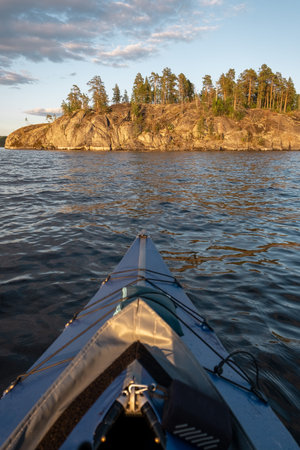 Ladoga lake. Panorama of the Republic of Karelia. Northern nature of Russia. View from the blue kayak from the water.の写真素材