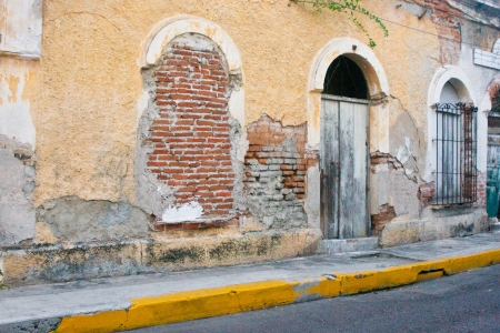 Rustic and weathered exterior of old colonial building incentral Mazatlan Mexicoの写真素材