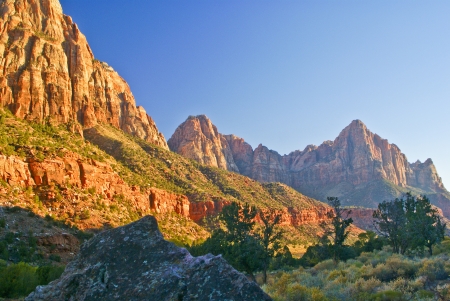 Rugged mountains in late afternoon along the Virgin River in Zion National Park in Utahの写真素材