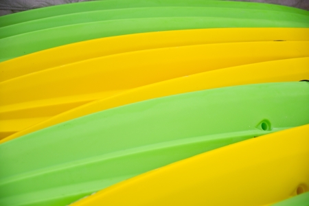 Colorful abstract showing the curved bottoms of sea kayaksの写真素材