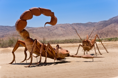 Borrego Springs, California - June 25, 2012  A giant Scorpion and Grasshopper join the sculpture collection of prehistoric animals on permanent display at Galetta Meadows のeditorial素材