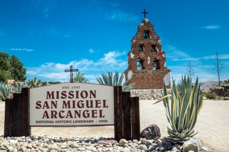 The sign and campanario at Mission San Miguel Arcangel in San Miguel, California along the historic mission trail の写真素材