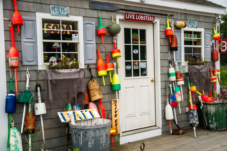 Rye, NH, USA - August 20, 2015:  Small shops serve the tourist market at the harbor in Rye, NH.