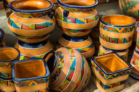 Traditional glazed Mexican talavera style pottery in southwestern patterns.の写真素材
