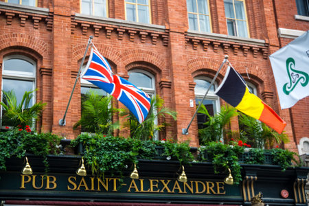 Quebec City, Canada - Sept. 8, 2015:  British and German flags fly above a British pub in Quebec...
