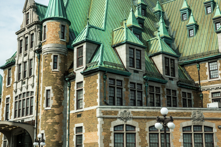 Quebec City, Quebec, Canada - Sept. 9, 2015: Windows poke out along the rooflines of an historic government building in Quebec City.のeditorial素材