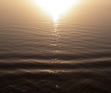 The morning sun reflecting off of water in the Pacific ocean