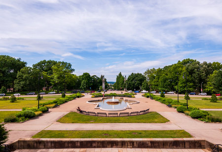 Pittsburgh, Pennsylvania, USA 06/09/2019 The gardens and fountain at the entrance to Highland Park...