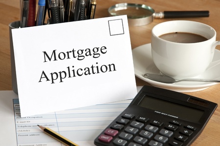 Mortgage application concept with envelope, calculator and pencilの写真素材