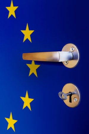 European Union flag painted on door, close up of door-handle and keyhole with key