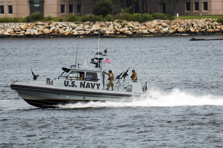 New London, Connecticut, USA - 27/7/2017: A U.S. Navy armed patrol boat protects the waters of the Long Island Sound in the  harbor around New London Connecticut.のeditorial素材